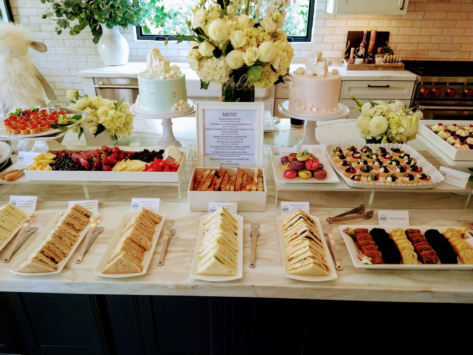 Afternoon tea displayed on our client's gorgeous counter