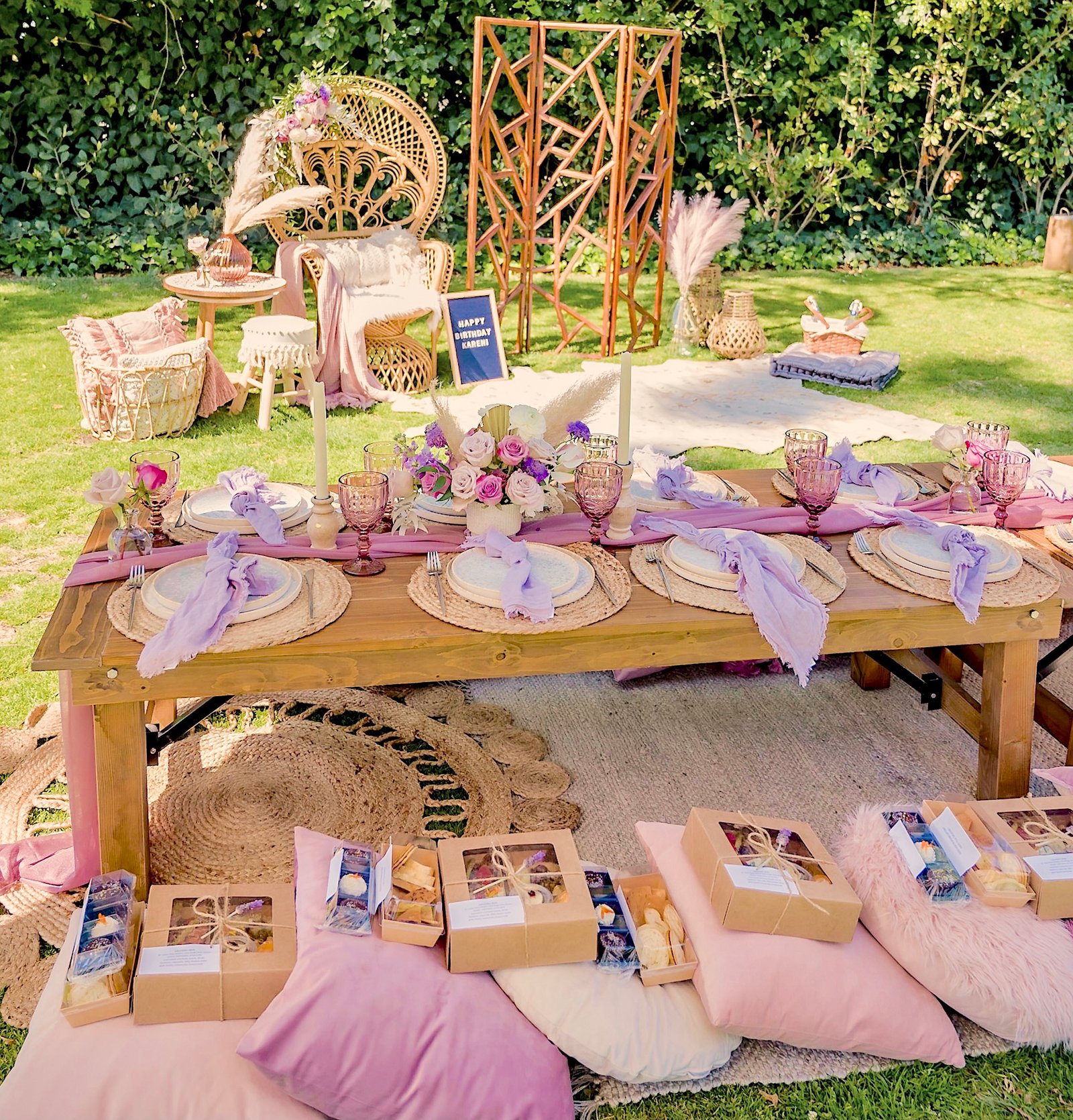 Our high tea assortment in individual packaging at a birthday picnic event