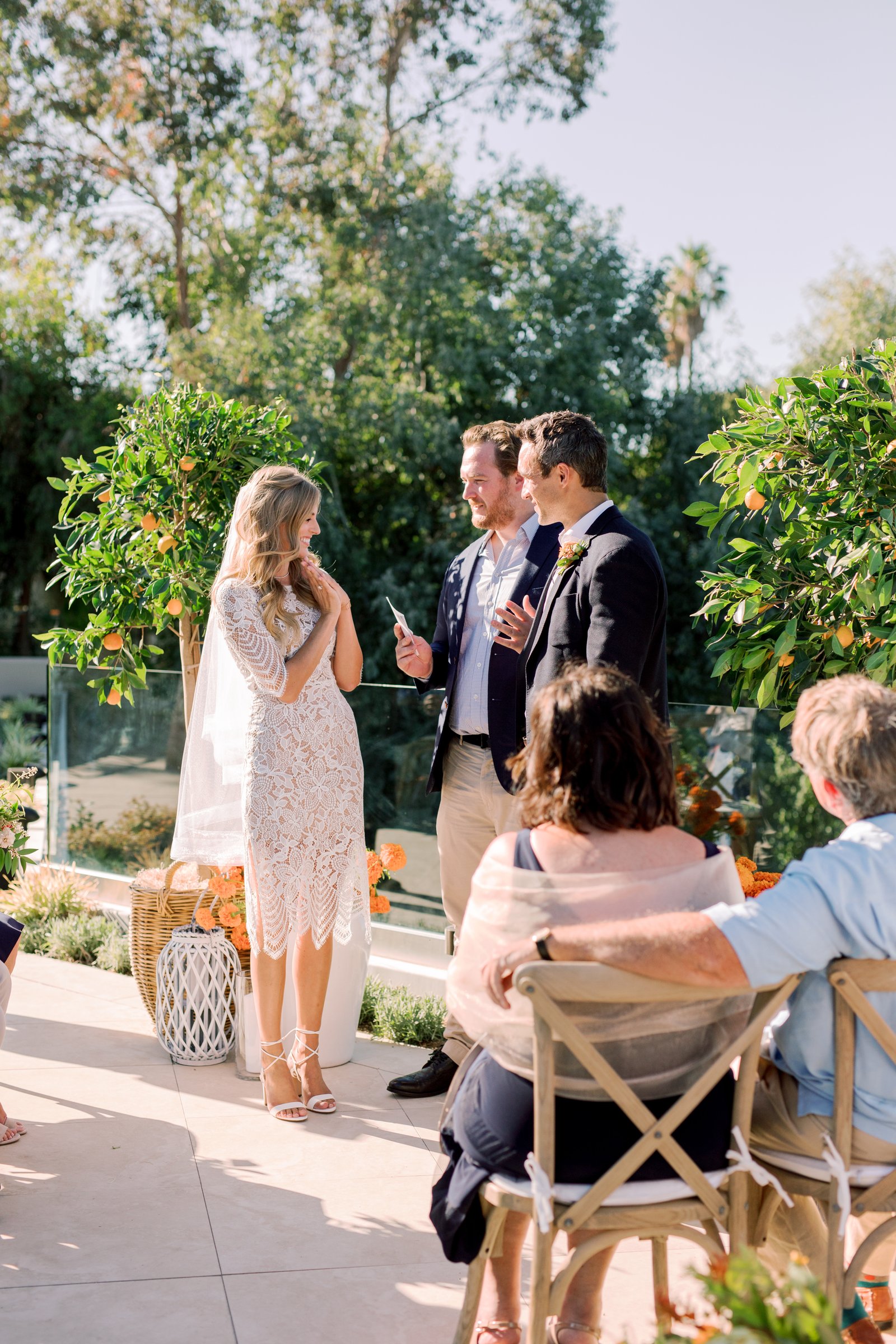 The Bridge and Groom say their vows in front of an intimate gathering of closest family and friends