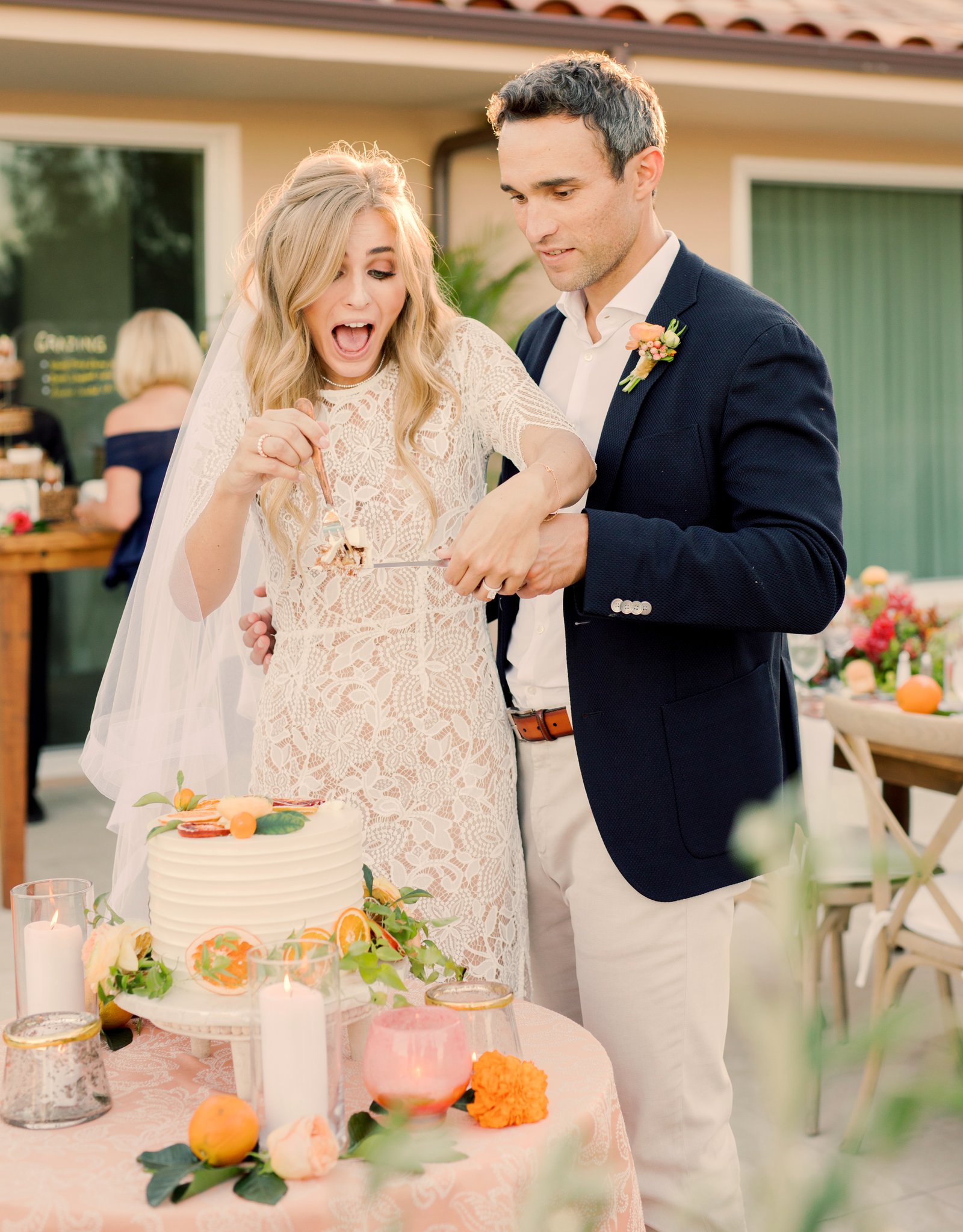 Bride and groom during the cake cutting 