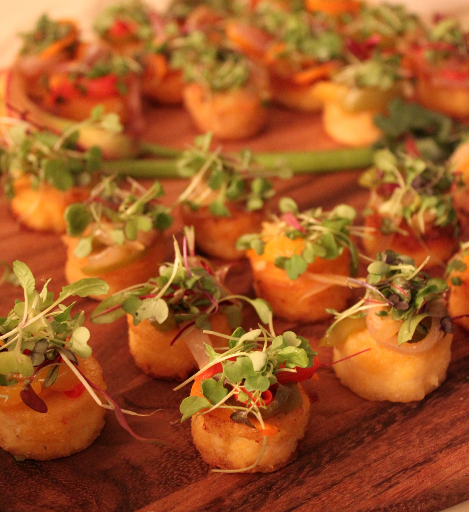 Sauteed Polenta Cakes with Mushroom Ragu and Microgreens