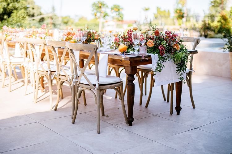 A summer-filled tablescape bursting with floral and fresh citrus